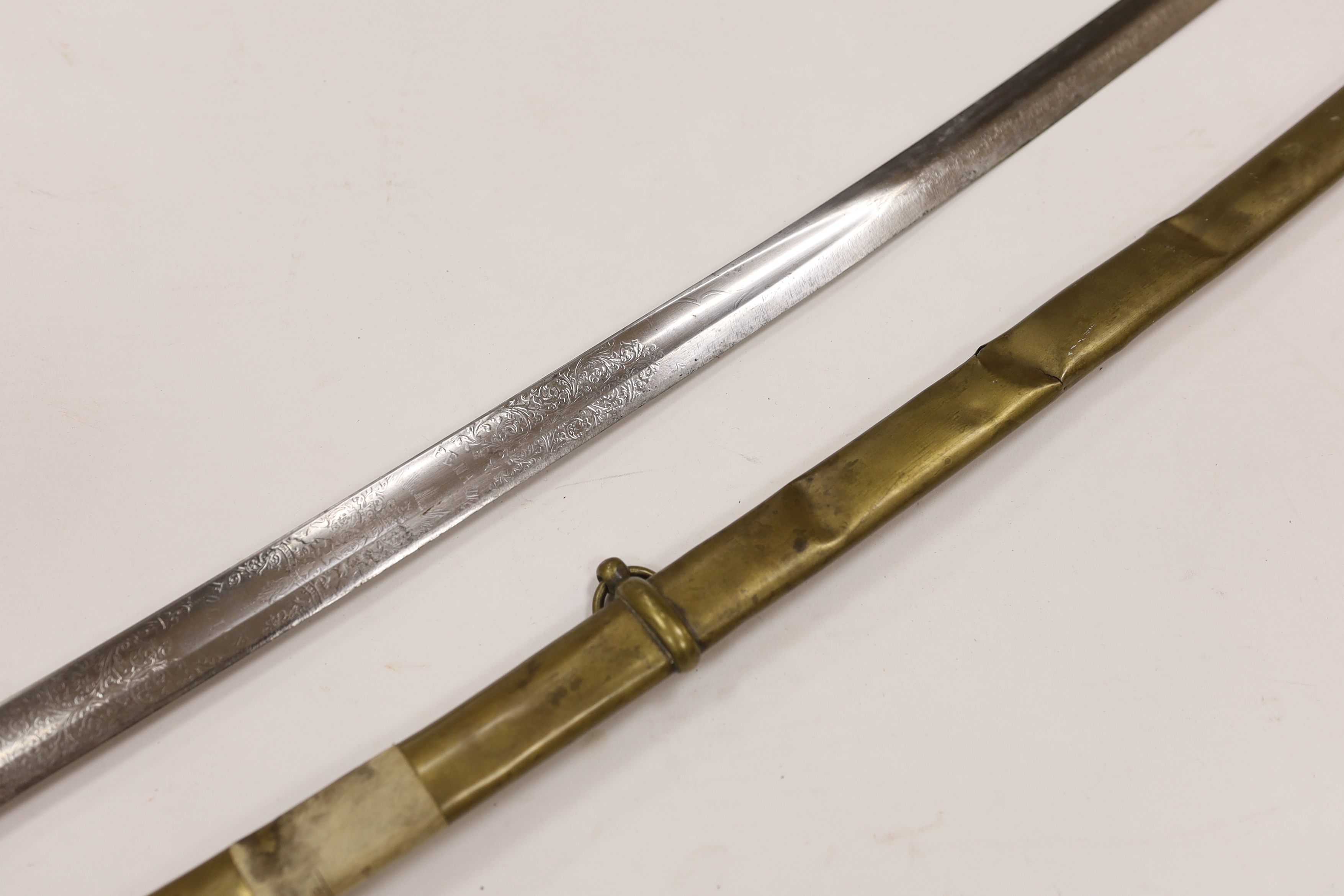 A scarce 1845 pattern infantry officer’s sword to the Penang Police, with regulation hilt, incomplete in its brass scabbard, blade 82cm